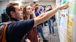 Participants from Collegiate Wind Competition 2019 present their research to the judges and their peers from other universities. Photo courtesy of Werner Slocum, NREL Participants from Collegiate Wind Competition 2019 present their research to the judges and their peers from other universities. Photo courtesy of Werner Slocum, NREL