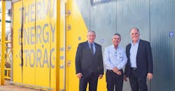 Brenmiller Energy and Fortlev executives stand in front of the thermal energy storage unit in Brazil.