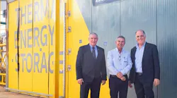 Brenmiller Energy and Fortlev executives stand in front of the thermal energy storage unit in Brazil.