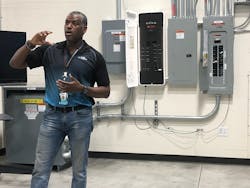 Rodney James, emerging technology development manager at Duke Energy, explains some of its home panel study work to visitors from the T&amp;D World Conference in Charlotte