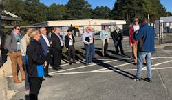 Tech tour attendees from the T&amp;D World Conference listen to Rodney James explain the components of the Mount Holly Microgrid. Attendees came from Tokyo Electric Power, Avangrid and other companies.