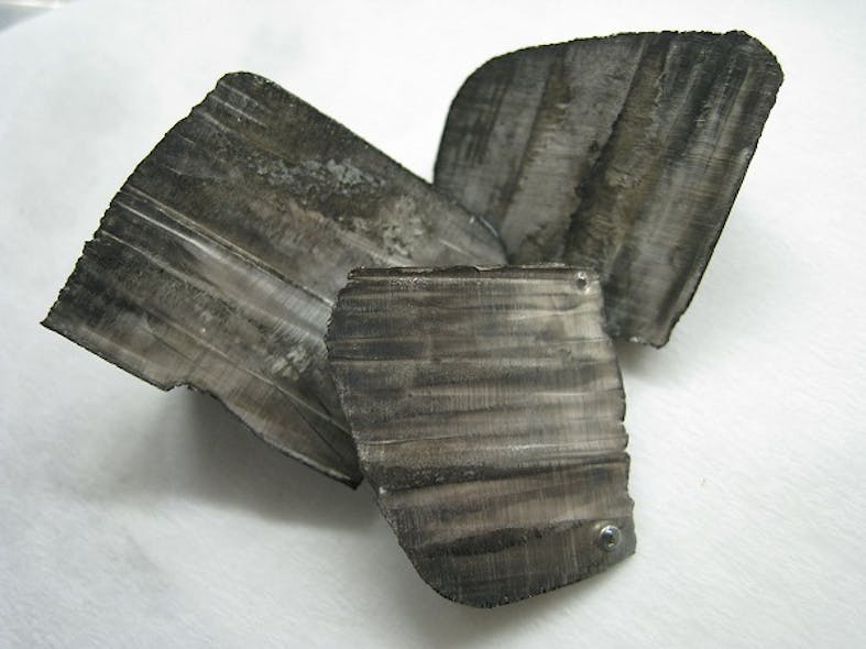 Lithium ingots with black nitride tarnish, Photo credit Dnn87, Wikimedia Commons.
