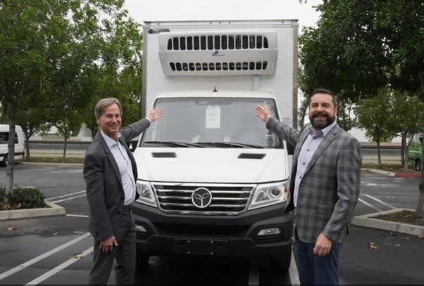 GreenPower executives show off the EV Star all-electric box truck.