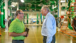 Danny Davies, left, President and CEO of C&C Group visits one of the buldings with Aspiria's Campus Director of Engineering, Gary Schlotzhauer. Image credit Schneider Electric Danny Davies, left, President and CEO of C&C Group visits one of the buldings with Aspiria's Campus Director of Engineering, Gary Schlotzhauer. Image credit Schneider Electric
