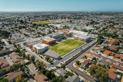 Aerial view of rooftop solar work at Samueli Academy. Image credit Motive Energy Aerial view of rooftop solar work at Samueli Academy. Image credit Motive Energy