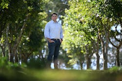 Jonathon McCarthy, chief decarbonization officer at Rio Tinto, standing among pongamia trees. Image credit Rio Tinto Jonathon McCarthy, chief decarbonization officer at Rio Tinto, standing among pongamia trees. Image credit Rio Tinto