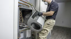 HVAC heat pump repair and replacement. ID 179458274 © David Spates | Dreamstime.com