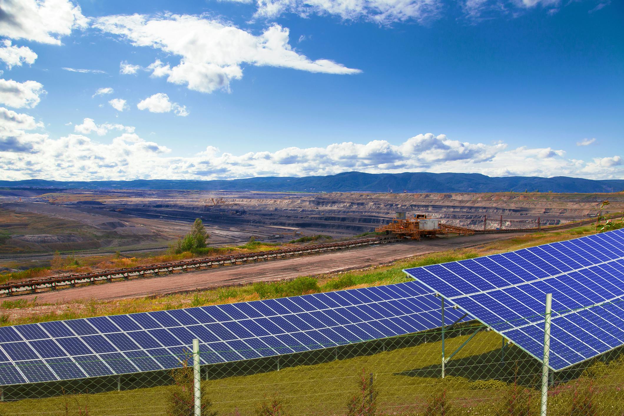Generic image of solar panels near coal mine. Image credit ID 62890970 &copy; Martinlisner | Dreamstime.com
