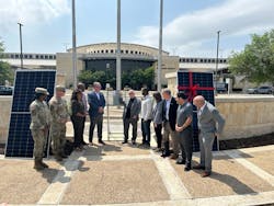 Killeen airport, city and Ameresco officials celebrate completion of the on-site solar and energy efficiency project. Killeen airport, city and Ameresco officials celebrate completion of the on-site solar and energy efficiency project.