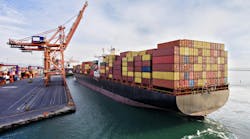 Aerial view of cargo ship in transit Aerial view of cargo ship in transit