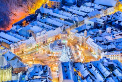 Lighted Christmas markets in Brasove, Romania. Image credit ID 106071119 | In © Emicristea | Dreamstime.com Lighted Christmas markets in Brasove, Romania. Image credit ID 106071119 | In © Emicristea | Dreamstime.com