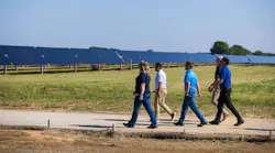 A team from LRE walks out to one of their solar projects in Oklahoma. Image credit Leeward Renewable Energy