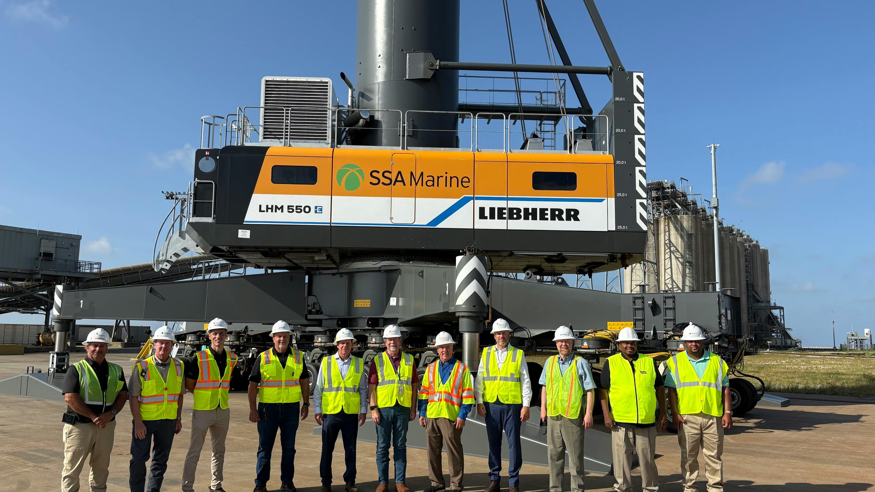 Representatives from SSA Marine, the Port of Gulfport and Chemours marking the Liebherr LHM 550 crane's arrival.