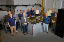 Researchers and partners from Lawrence Livermore National Laboratory and Pacific Fusion gather around the Sirius pulsed-power prototype. Image credit Garry McLeod/LLNL