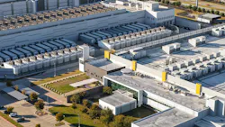 Aerial view of large scale data center campus with server and cooling units.